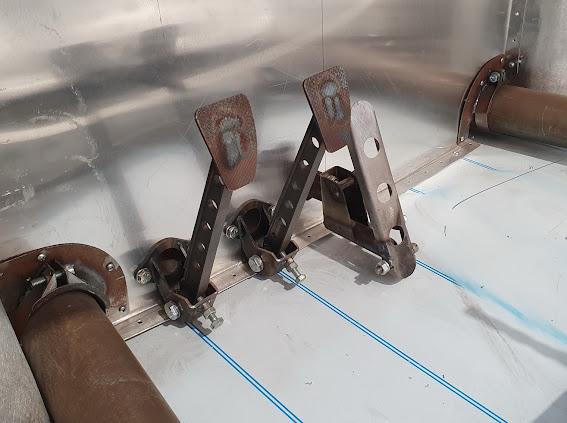 Brake and clutch pedal assemblies in the bare shell