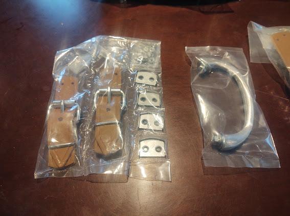Bonnet straps and brightwork, as supplied