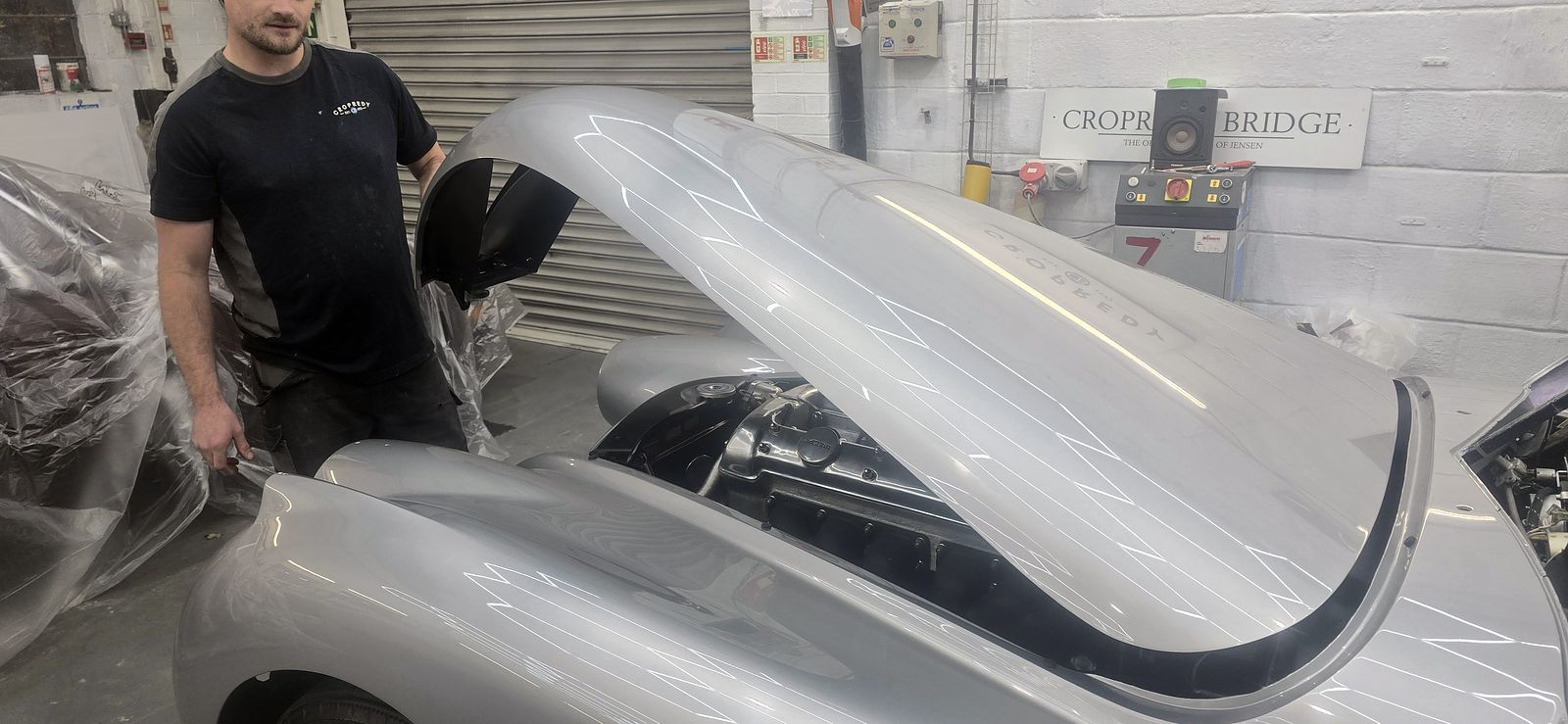 Protective film on the XK120's fresh paintwork with the bonnet open