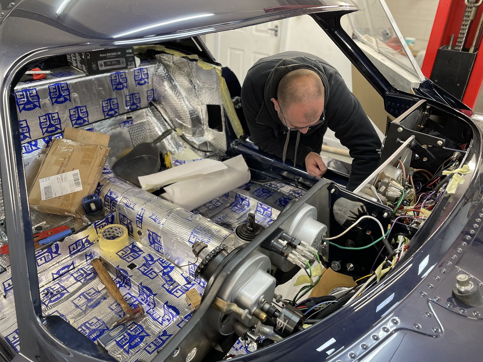 Build process — cabin lined with sound-deadening insulation
