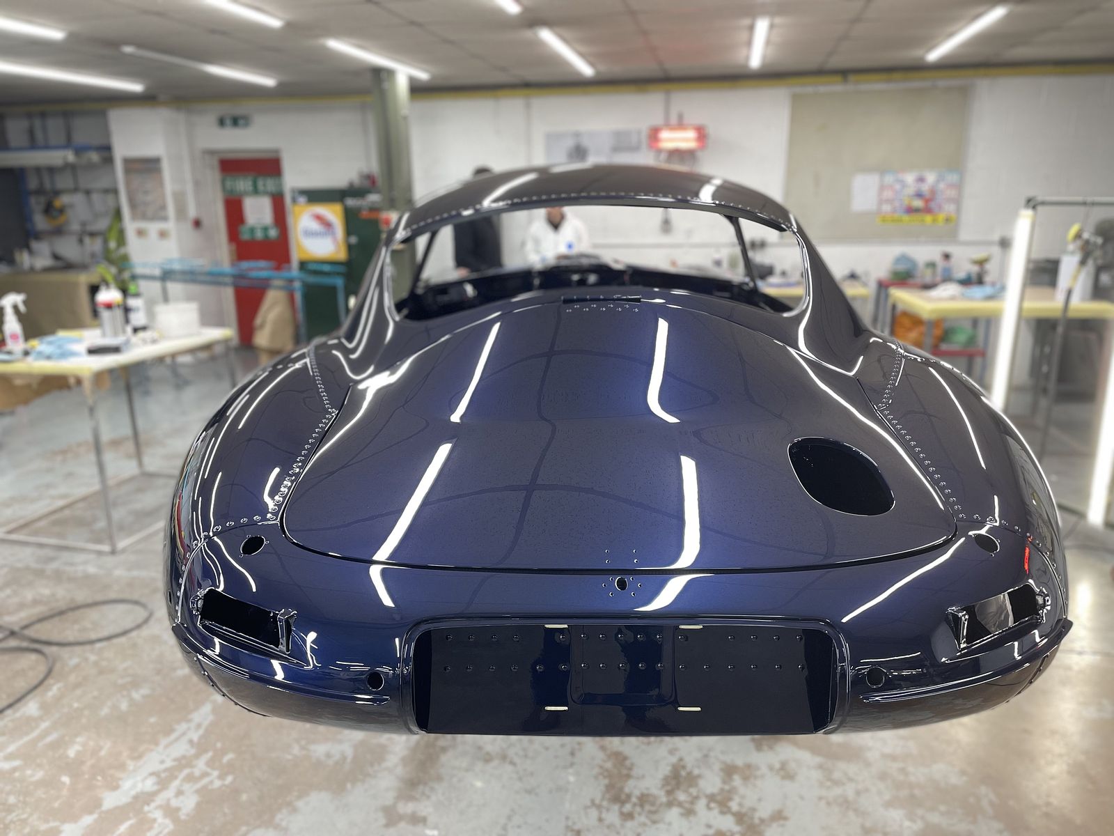 Build process — dark blue body shell in the paint shop