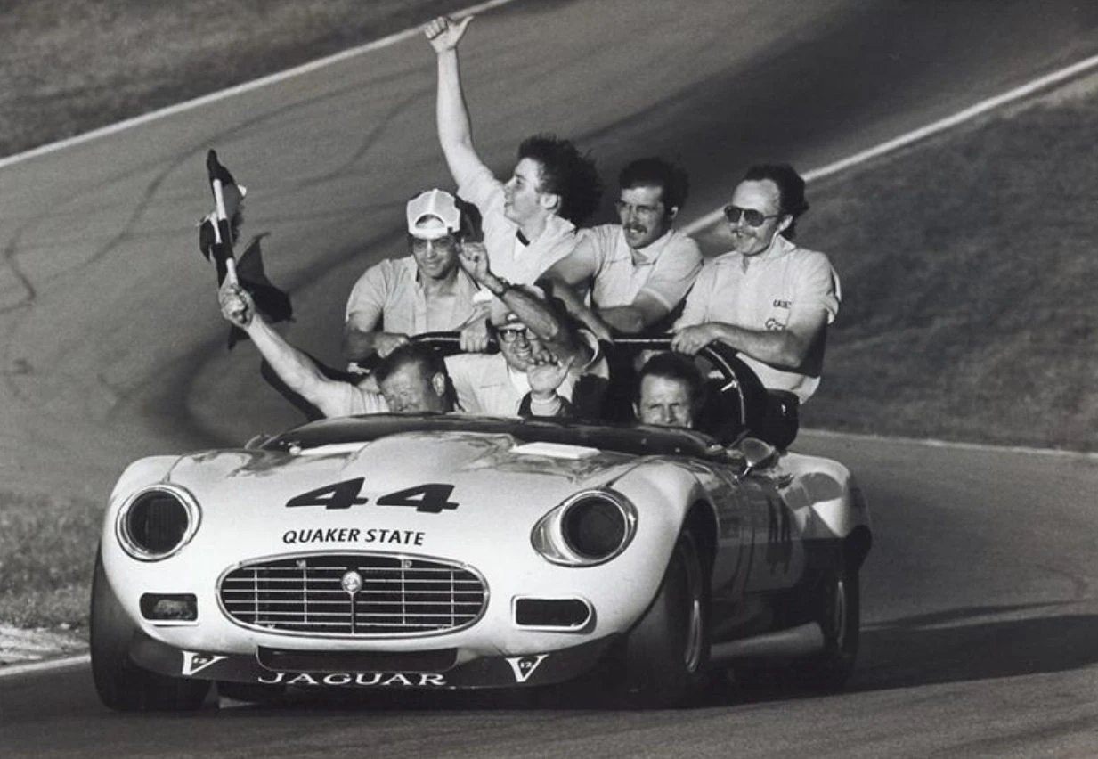 Victory lane: Group 44’s crew celebrate aboard the number 44 E-type