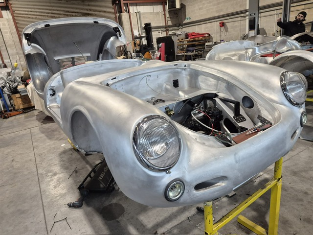 Bare metal body mounted on stands