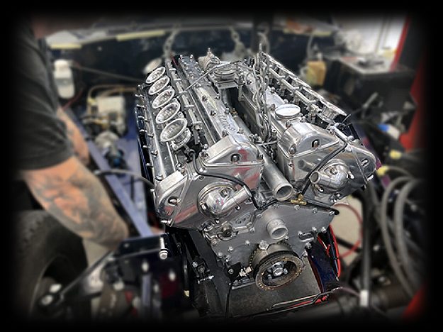 tera® quad-cam V12 engine on display in the workshop